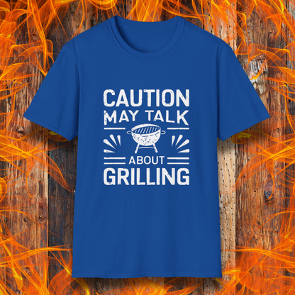 Royal Blue T-shirt featuring bold white text that reads 'CAUTION MAY TALK ABOUT GRILLING,' with a vintage-style BBQ grill illustration and decorative lines. Perfect for passionate grill masters who can't stop talking about barbecue.