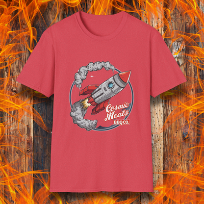 Heather Red t-shirt featuring a retro-style rocket blasting off with smoke trails, paired with the text 'Cosmic Meats BBQ Co.'—a fun BBQ-themed space design.