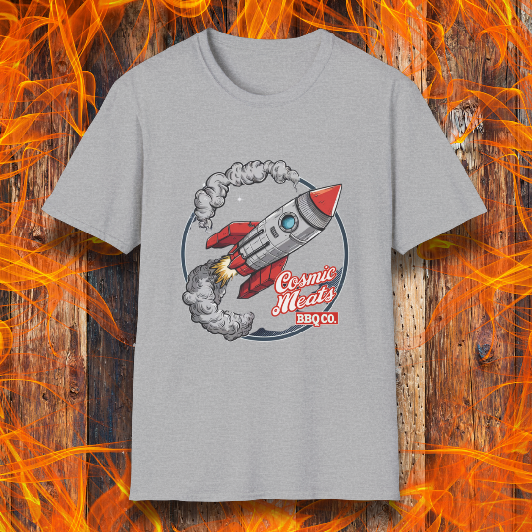 Sport Grey t-shirt featuring a retro-style rocket blasting off with smoke trails, paired with the text 'Cosmic Meats BBQ Co.'—a fun BBQ-themed space design.