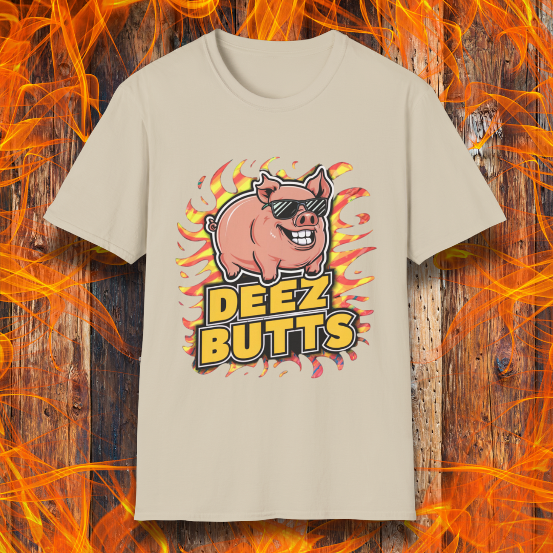 Sand T-Shirt showcasing a pig with sunglasses and the phrase "Deez Butts" sitting below the pig in bold yellow lettering.