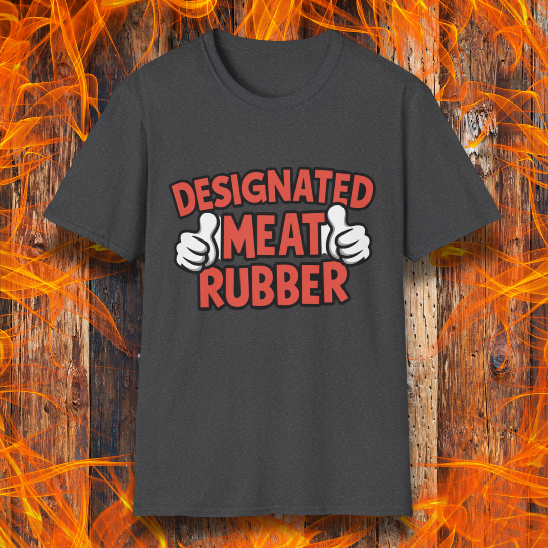 Dark Heather T-shirt featuring bold text reading 'Designated Meat Rubber' with two thumbs-up graphics, a humorous BBQ-themed design for grill masters and barbecue lovers.
