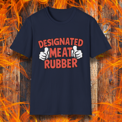 Navy T-shirt featuring bold text reading 'Designated Meat Rubber' with two thumbs-up graphics, a humorous BBQ-themed design for grill masters and barbecue lovers.
