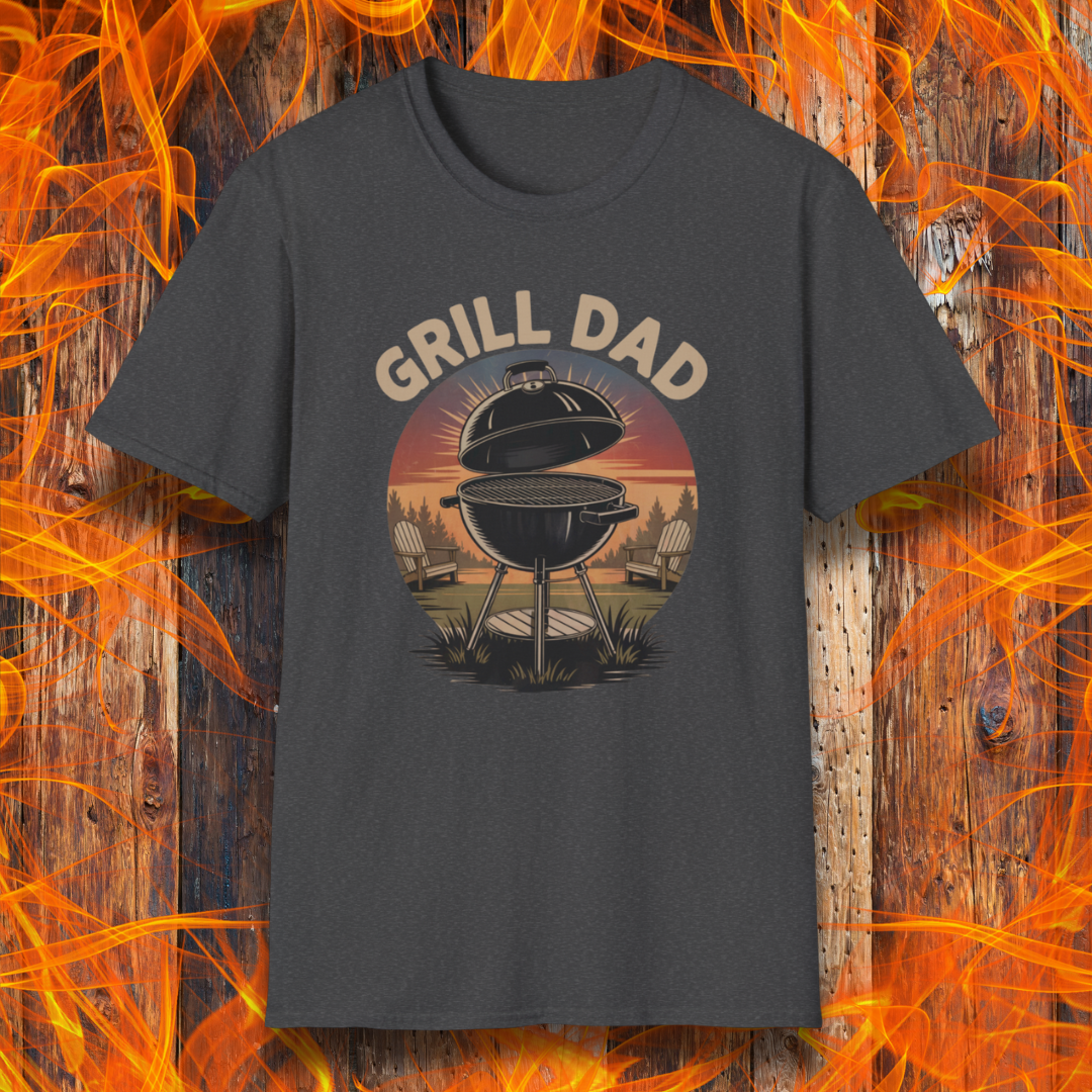 Dark Heather t-shirt with 'Grill Dad' graphic on a wooden background with flames.