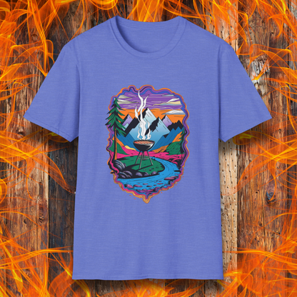Heather Royal T-shirt featuring a vibrant and artistic illustration of a scenic mountain landscape with a smoking grill at the center, surrounded by a flowing river, pine trees, and a colorful sky. The design evokes a love for outdoor grilling and adventure, making it a perfect choice for BBQ and nature enthusiasts.