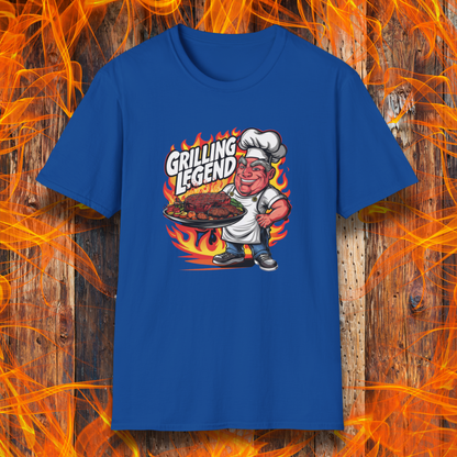 Royal t-shirt featuring a cartoon-style chef character holding a platter of perfectly grilled meats, with flames in the background and bold text that reads 'Grilling Legend'—ideal for BBQ masters and pit bosses