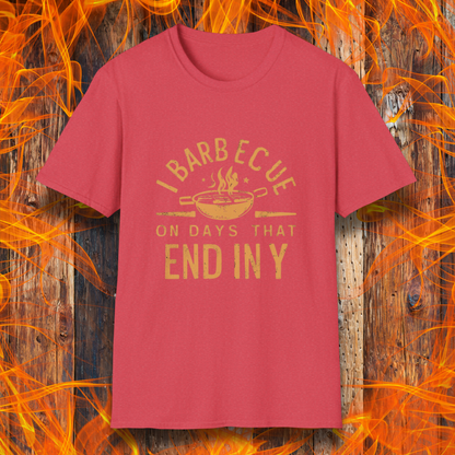 Heather Red T-shirt with 'I Barbecue on Days That End in Y' in bold, rustic orange lettering, featuring a steaming grill pan graphic. Perfect for grill masters who believe every day is BBQ day!