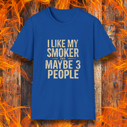 Royal Blue T-shirt featuring bold, distressed beige text that reads, 'I Like My Smoker And Maybe 3 People.' A humorous BBQ-themed shirt perfect for pitmasters and grilling enthusiasts who prefer the company of their smoker over most people!