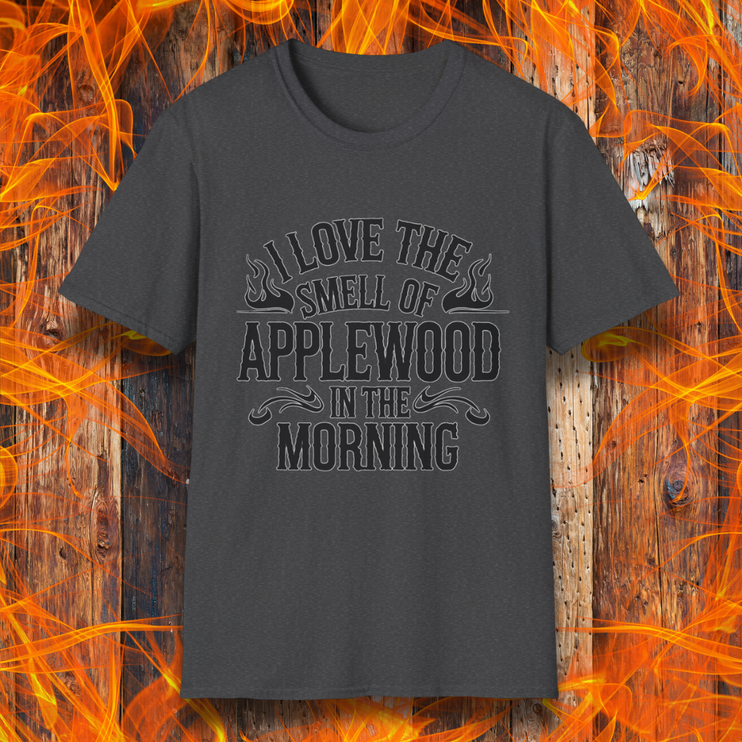 Dark Heather T-shirt featuring bold, rustic-style text that says, "I Love the Smell of Applewood in the Morning," with decorative flames. Perfect for BBQ lovers who appreciate the scent of wood-smoked meats.