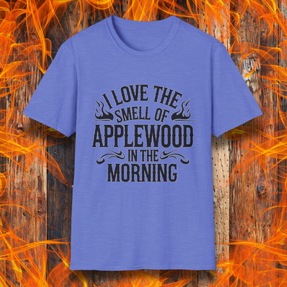 Heather Royal T-shirt featuring bold, rustic-style text that says, "I Love the Smell of Applewood in the Morning," with decorative flames. Perfect for BBQ lovers who appreciate the scent of wood-smoked meats.