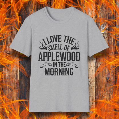 Sport Grey T-shirt featuring bold, rustic-style text that says, "I Love the Smell of Applewood in the Morning," with decorative flames. Perfect for BBQ lovers who appreciate the scent of wood-smoked meats.