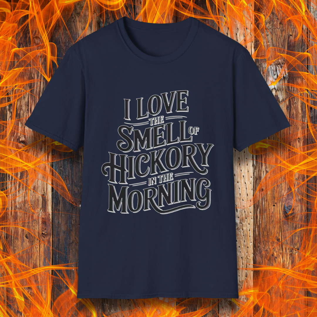 Navy T-shirt featuring bold, vintage-style text that reads, "I Love the Smell of Hickory in the Morning." Perfect for BBQ enthusiasts who enjoy the aroma of smoked meat.