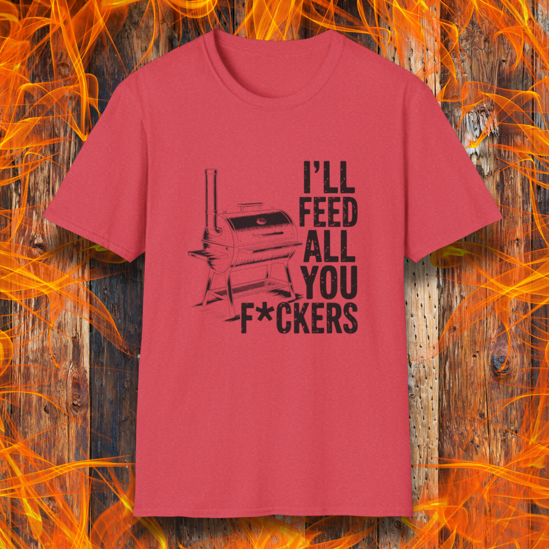 Heather Red  t-shirt featuring a bold smoker graphic and the unapologetically hilarious line: “I’ll Feed All You F*ckers.” 