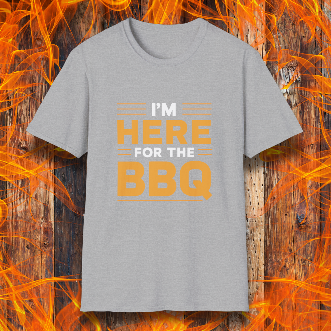 Sport Grey T-shirt with bold text reading 'I'M HERE FOR THE BBQ' in orange and white, accented with horizontal lines for emphasis. A stylish and fun design for BBQ lovers and grill masters.