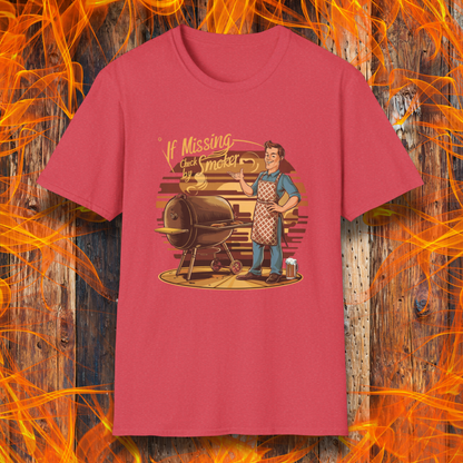 Read Heather  t-shirt featuring a retro-style illustration of a man grilling next to a smoker, with the phrase 'If Missing, Check by Smoker,' displayed against a fiery wooden background."