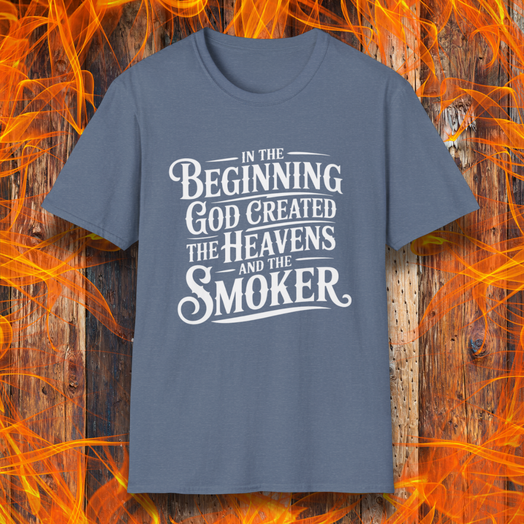 Heather Indigo t-shirt with bold white lettering that reads, “In the beginning, God created the heavens and the smoker.” A must-have for BBQ believers.