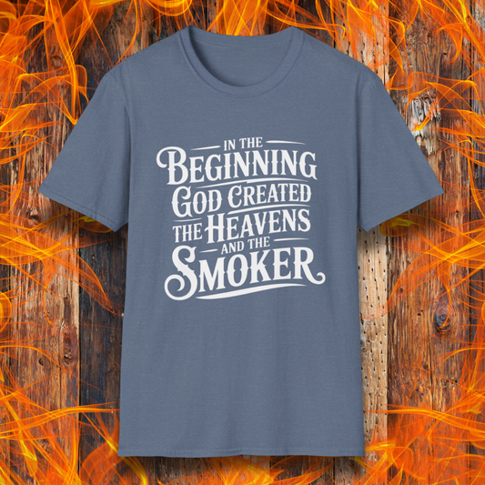 Heather Indigo t-shirt with bold white lettering that reads, “In the beginning, God created the heavens and the smoker.” A must-have for BBQ believers.