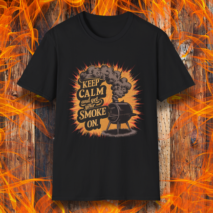 Black t-shirt featuring a vintage-style illustration of a smoker grill with smoke billowing out, alongside the phrase 'Keep Calm and Get Your Smoke On' in bold typography.