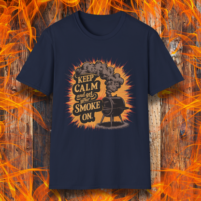 Navy t-shirt featuring a vintage-style illustration of a smoker grill with smoke billowing out, alongside the phrase 'Keep Calm and Get Your Smoke On' in bold typography.