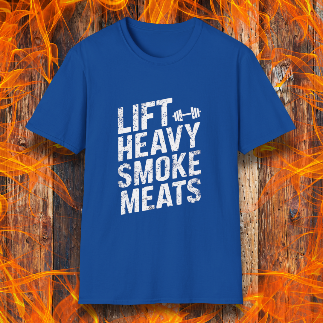 Royal Blue T-shirt with bold, distressed white text reading 'Lift Heavy Smoke Meats,' featuring a barbell icon. A perfect fit for BBQ lovers and gym enthusiasts who take their grilling and gains seriously!