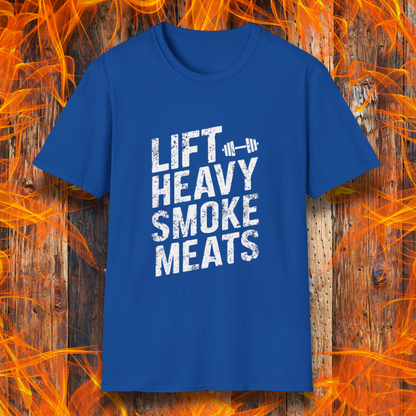 Royal Blue T-shirt with bold, distressed white text reading 'Lift Heavy Smoke Meats,' featuring a barbell icon. A perfect fit for BBQ lovers and gym enthusiasts who take their grilling and gains seriously!