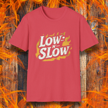 Heather Red T-shirt featuring 'Low-N-Slow' in bold, distressed lettering over a fiery background. Perfect for BBQ pitmasters who know that great barbecue takes time!