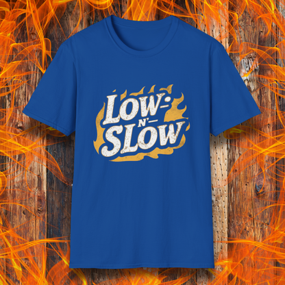 Royal Blue  T-shirt featuring 'Low-N-Slow' in bold, distressed lettering over a fiery background. Perfect for BBQ pitmasters who know that great barbecue takes time!