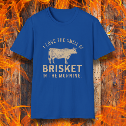 Royal Blue T-shirt featuring vintage-style text that reads 'I Love the Smell of Brisket in the Morning,' along with a rustic, hand-drawn cow illustration. A must-have for BBQ lovers and brisket enthusiasts!