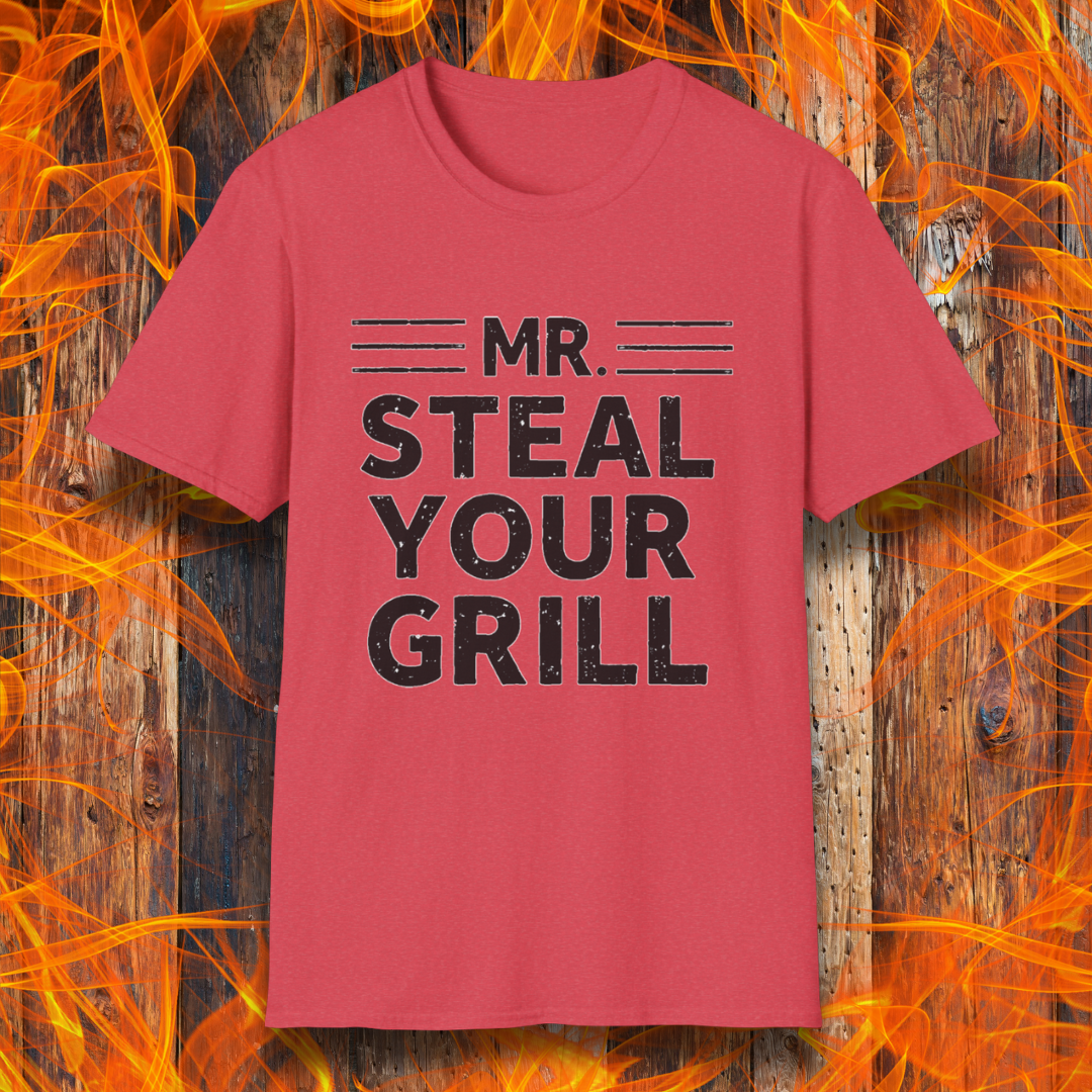 T-shirt featuring bold, distressed black text that reads "MR. STEAL YOUR GRILL," with horizontal lines above and below "MR." The design is playful and humorous, perfect for BBQ enthusiasts who take pride in their grilling skills.