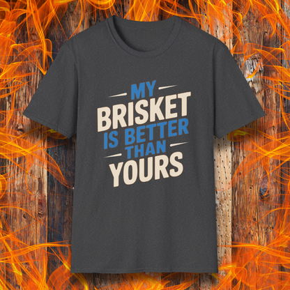 Dark Heather T-shirt featuring a bold BBQ-themed design that reads 'MY BRISKET IS BETTER THAN YOURS' in cream and blue block lettering with accent lines. A perfect shirt for competitive grillers and brisket masters who love to show off their smoking skills.