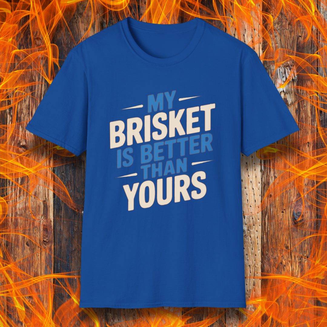 Royal Blue T-shirt featuring a bold BBQ-themed design that reads 'MY BRISKET IS BETTER THAN YOURS' in cream and blue block lettering with accent lines. A perfect shirt for competitive grillers and brisket masters who love to show off their smoking skills.