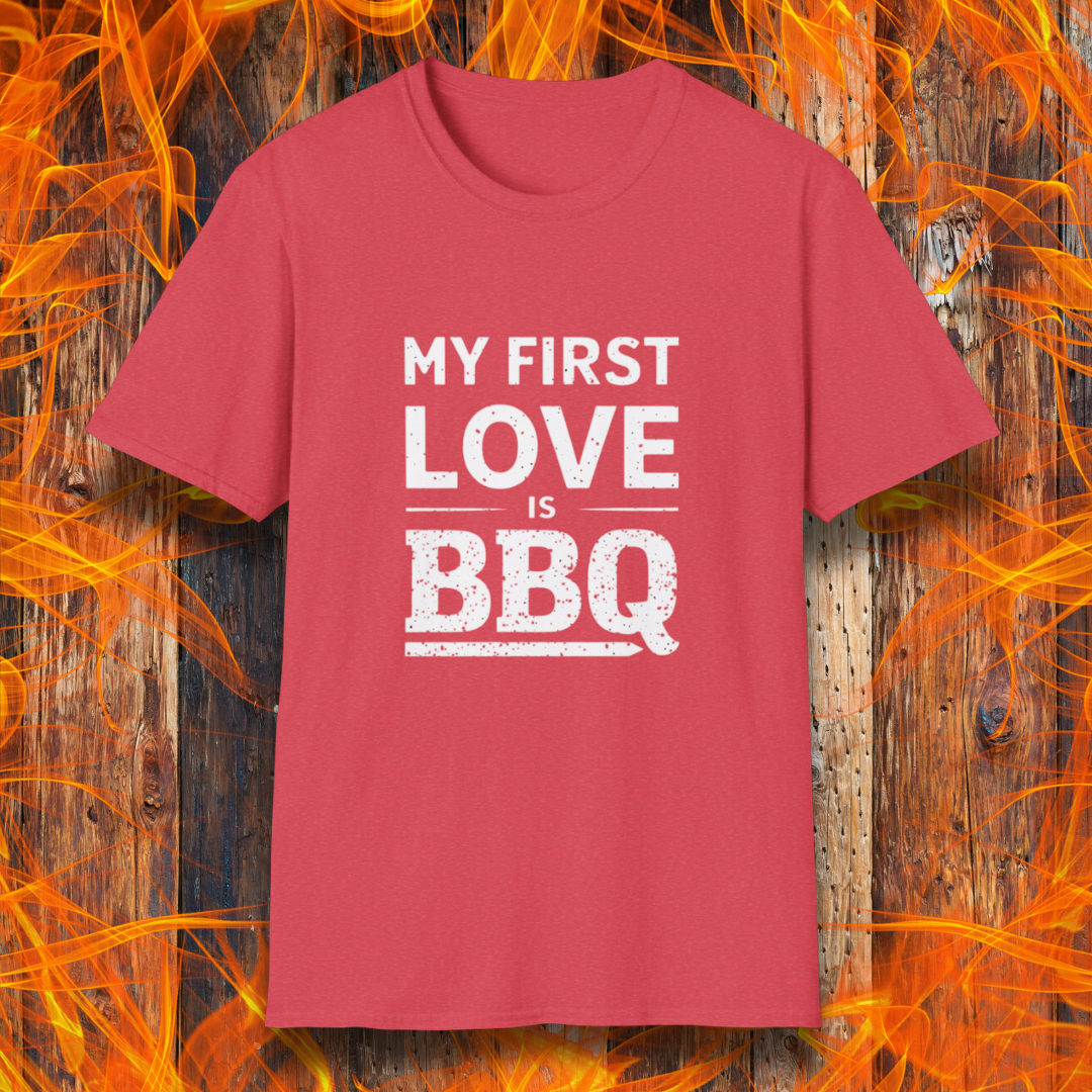 Heather Red T-shirt with 'My First Love Is BBQ' in bold, distressed white lettering. A must-have for BBQ enthusiasts who wear their passion on their sleeve—literally!