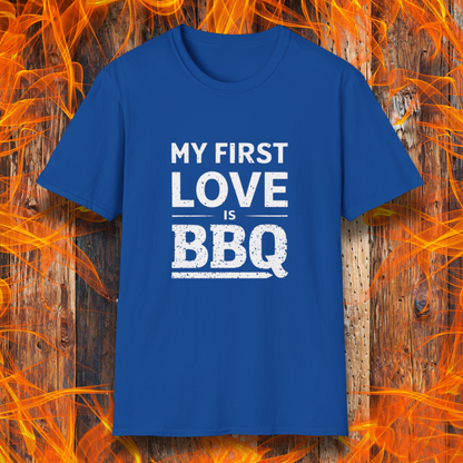 Royal Blue T-shirt with 'My First Love Is BBQ' in bold, distressed white lettering. A must-have for BBQ enthusiasts who wear their passion on their sleeve—literally!