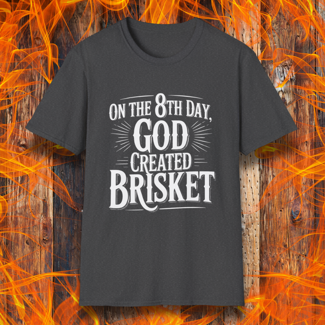 Dark Heather t-shirt with bold white lettering that declares “On the 8th Day, God Created Brisket.” A divine pick for pitmasters who treat smoked meat like gospel.