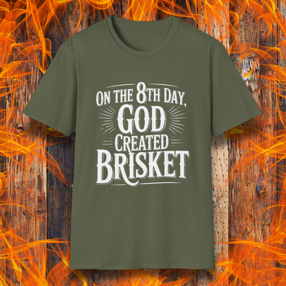 Military Green t-shirt with bold white lettering that declares “On the 8th Day, God Created Brisket.” A divine pick for pitmasters who treat smoked meat like gospel.
