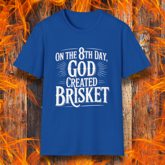 Royal blue t-shirt with bold white lettering that declares “On the 8th Day, God Created Brisket.” A divine pick for pitmasters who treat smoked meat like gospel.
