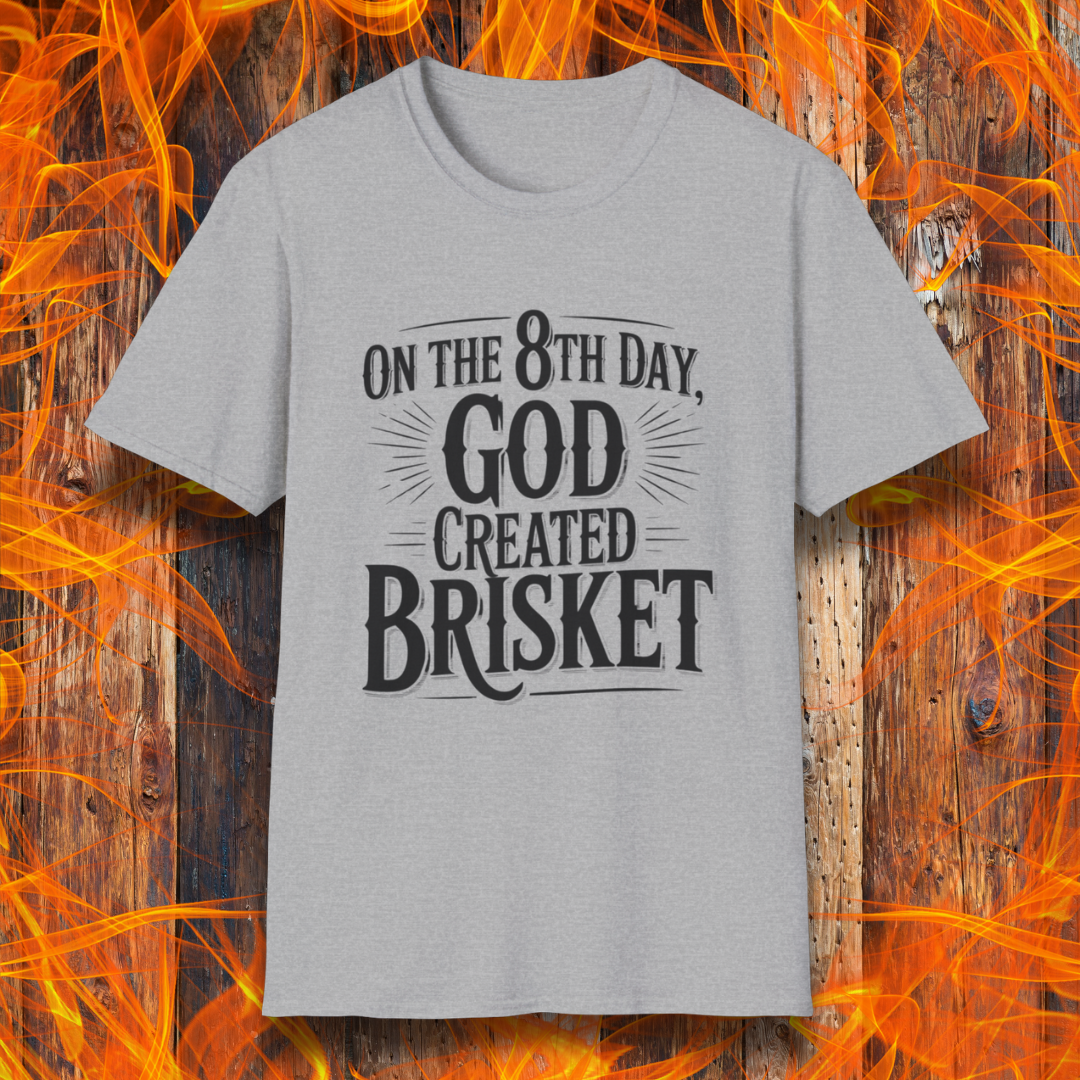 Sport Grey t-shirt with bold black lettering that declares “On the 8th Day, God Created Brisket.” A divine pick for pitmasters who treat smoked meat like gospel.