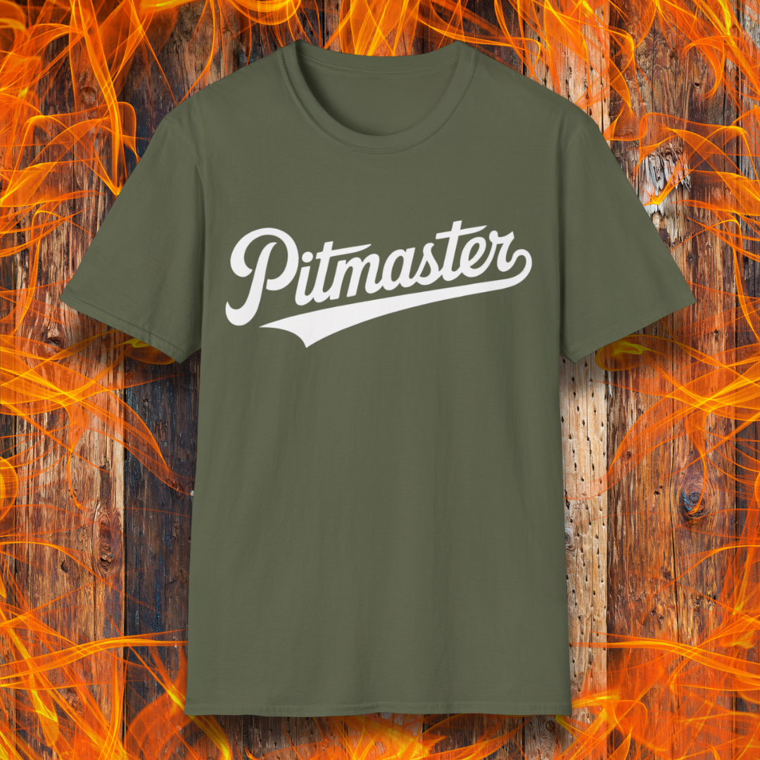 Military Green t-shirt with 'Pitmaster' text on a wooden background with flames.