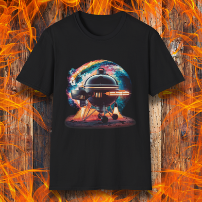 Black T-shirt featuring a futuristic BBQ kettle grill designed like a rocket ship, with glowing thrusters, steam, and a cosmic background. A perfect design for BBQ lovers with a passion for sci-fi and grilling.