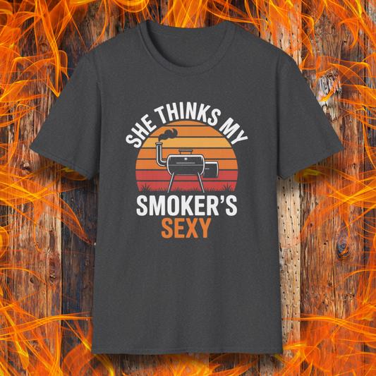 Dark Heather t-shirt with graphic design and text on a wooden background with flames