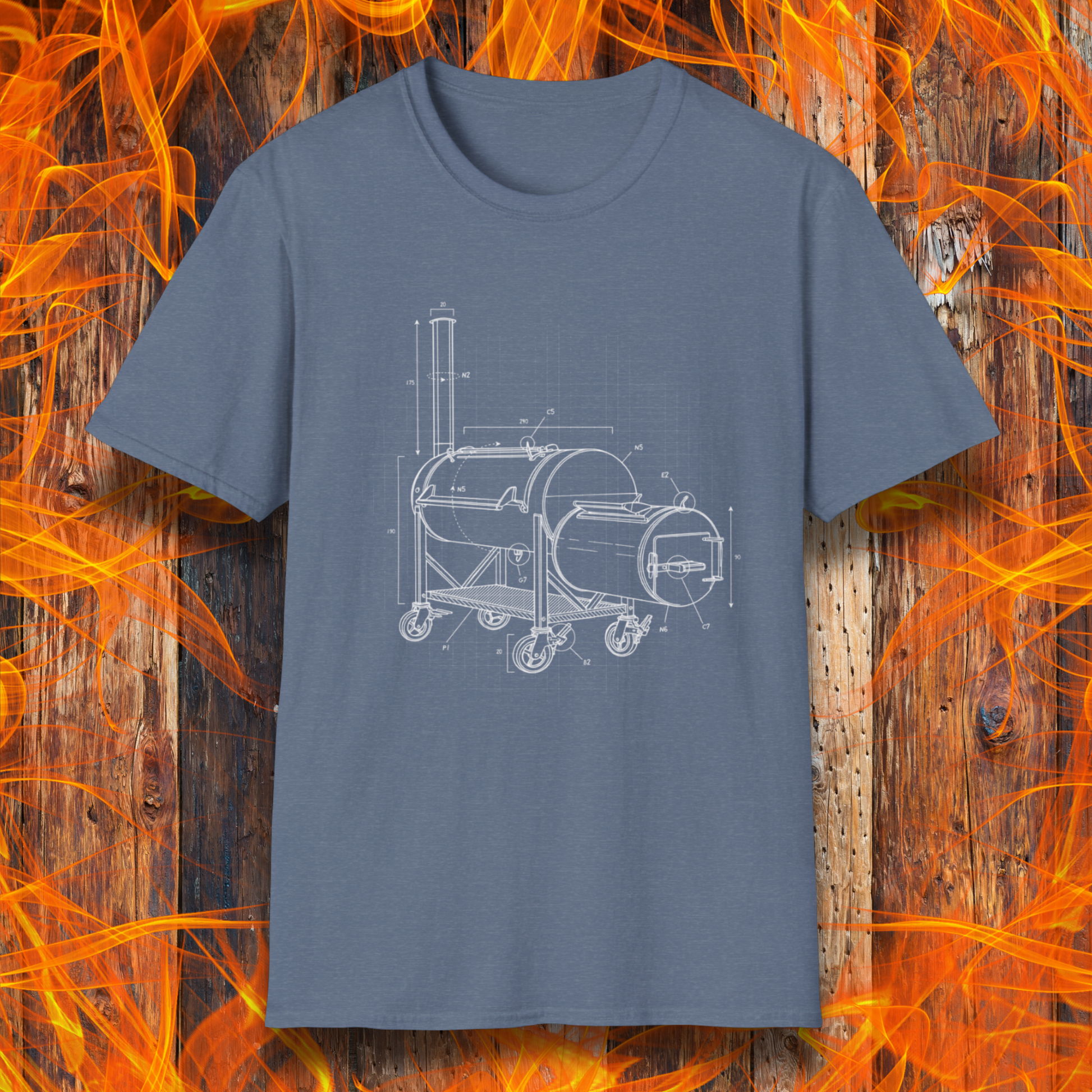Blue t-shirt with barbecue grill design on a wooden background with flames