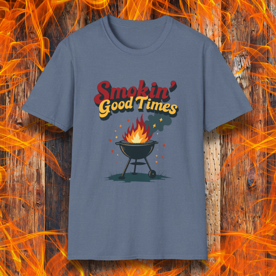 Heather Indigo T-shirt featuring a fun and retro-style design with the phrase "Smokin' Good Times" in bold red and yellow lettering above a classic charcoal grill with flames and smoke rising. Small sparks and decorative elements enhance the playful BBQ-themed aesthetic, making it a perfect choice for grilling enthusiasts who love to bring the heat.