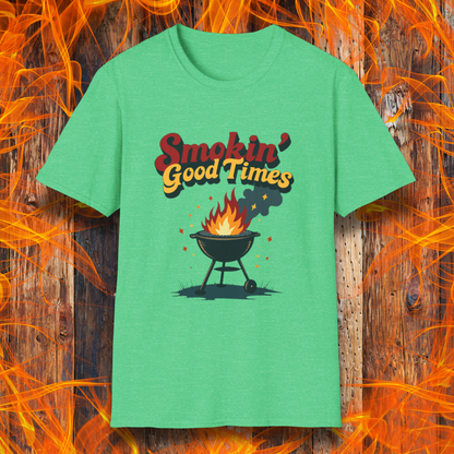 Heather Irish Green T-shirt featuring a fun and retro-style design with the phrase "Smokin' Good Times" in bold red and yellow lettering above a classic charcoal grill with flames and smoke rising. Small sparks and decorative elements enhance the playful BBQ-themed aesthetic, making it a perfect choice for grilling enthusiasts who love to bring the heat.