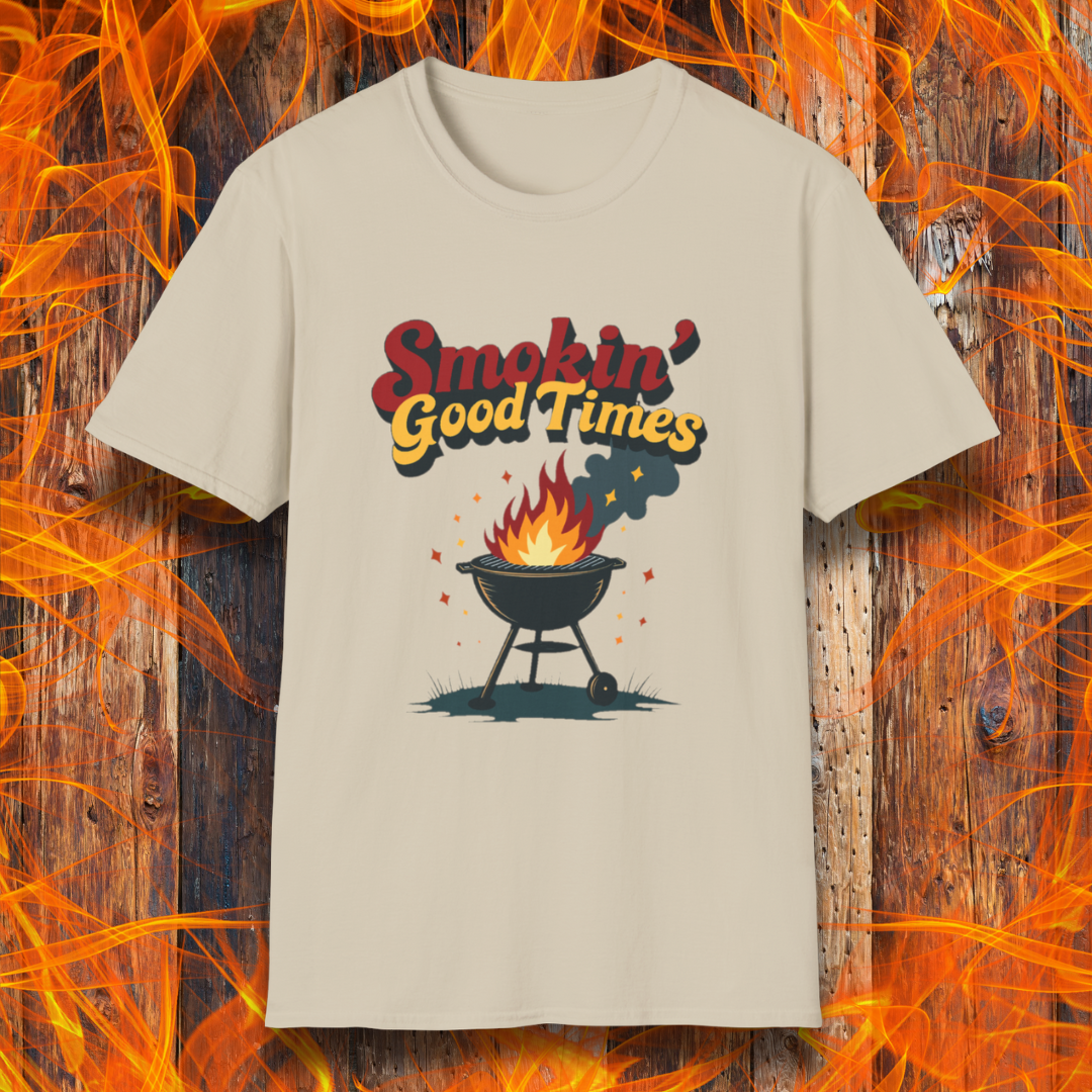 Sand T-shirt featuring a fun and retro-style design with the phrase "Smokin' Good Times" in bold red and yellow lettering above a classic charcoal grill with flames and smoke rising. Small sparks and decorative elements enhance the playful BBQ-themed aesthetic, making it a perfect choice for grilling enthusiasts who love to bring the heat.