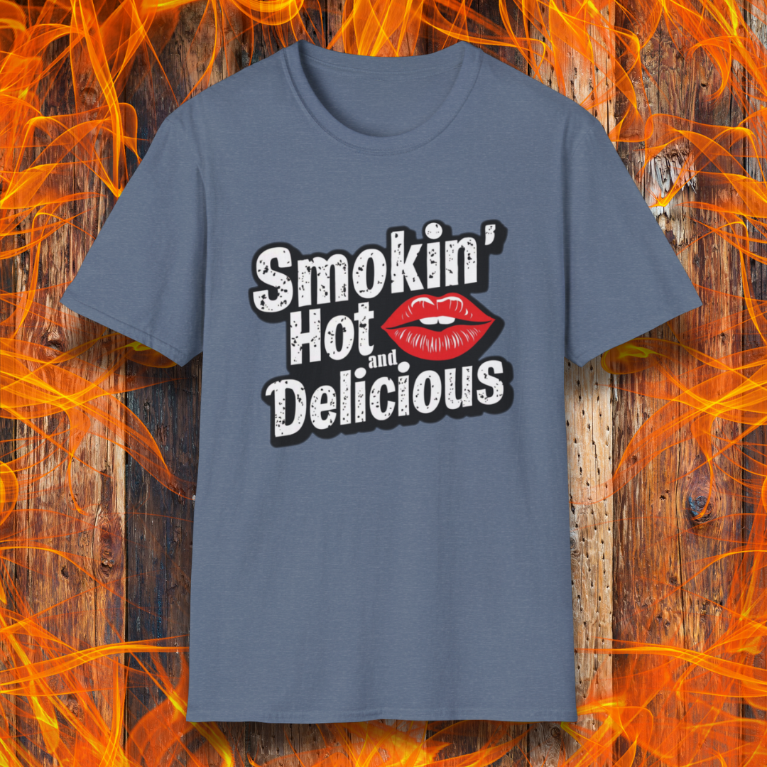 Heather Indigo t-shirt featuring bold white text that reads 'Smokin' Hot and Delicious,' with a red lips graphic replacing the 'o' in 'Hot' for a fun, flirty BBQ-inspired design