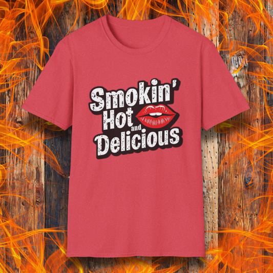 Heather Red t-shirt featuring bold white text that reads 'Smokin' Hot and Delicious,' with a red lips graphic replacing the 'o' in 'Hot' for a fun, flirty BBQ-inspired design