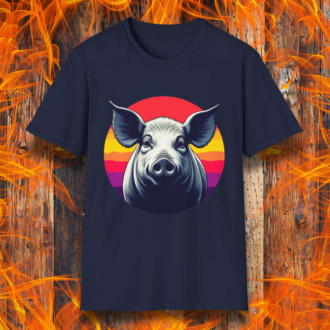 Navy T-shirt featuring a striking illustration of a pig's face in a bold, high-contrast style, set against a circular sunset background with vibrant red, orange, and purple hues. The design gives a rustic yet modern feel, making it an excellent choice for BBQ lovers.