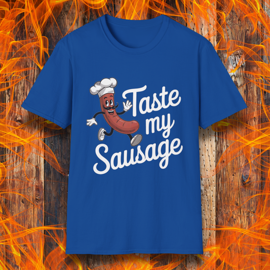 Royal Blue “Taste My Sausage” tee! Featuring a cheeky cartoon sausage in a chef hat, it’s perfect for grill masters who like their humor served hot.