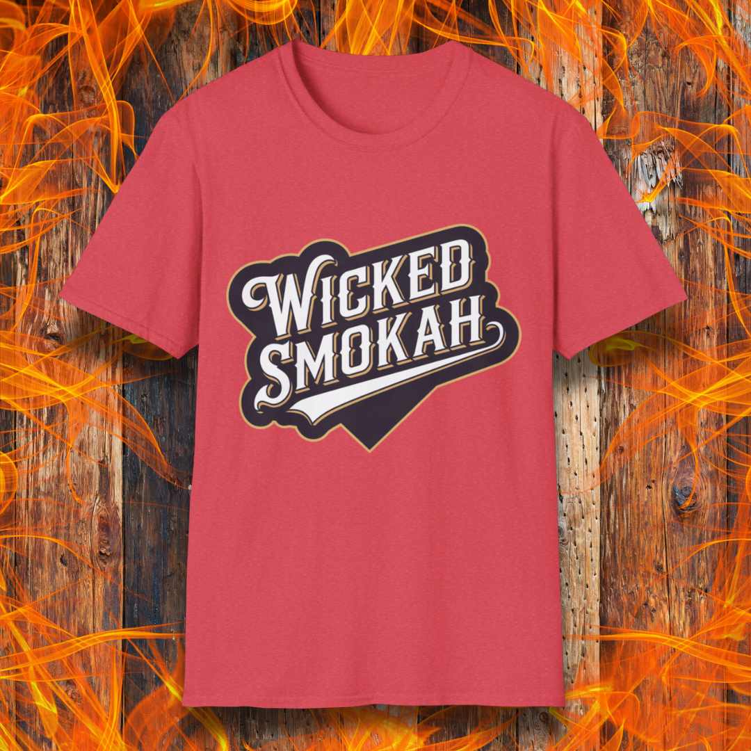 Heather Red T-shirt featuring a bold, vintage-style design that reads "Wicked Smokah" in stylized typography, resembling a sports team logo. The lettering has a mix of white and gold outlines, giving it a classic and rugged look. The shirt is displayed against a fiery wooden background, reinforcing the smoky BBQ theme.